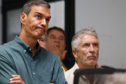 Fernando Grande-Marlaska y Pedro Sánchez
