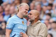 Haaland y Pep Guardiola durante un partido.