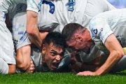 GENOA, ITALY - DECEMBER 14: Lautaro Martinez of Inter (left) celebrates with his team-mate Petar Sucic after scoring a goal during the Serie A match between Genoa CFC and FC Internazionale at Luigi Ferraris Stadium on December 14, 2025 in Genoa, Italy. (Photo by Simone Arveda/Getty Images)