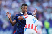 PHILADELPHIA, PENNSYLVANIA - JULY 04: Kylian Mbappe #10 of France is pushed by Juan Jose Caceres #4 of Paraguay during the FIFA World Cup 2026 Round of 16 match between Paraguay and France at Philadelphia Stadium on July 04, 2026 in Philadelphia, Pennsylvania. (Photo by Buda Mendes/Getty Images)