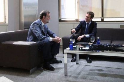 Rajoy y Casado este lunes en Génova 13.