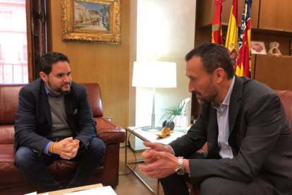 David Caballero con Carlos González.