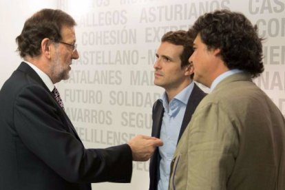 Rajoy, Casado y Moragas.