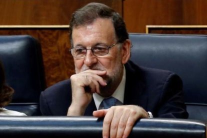 Mariano Rajoy, pensativo, en su escaño del Congreso.