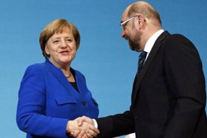 Merkel y Schulz, en una imagen que simboliza su probable acuerdo