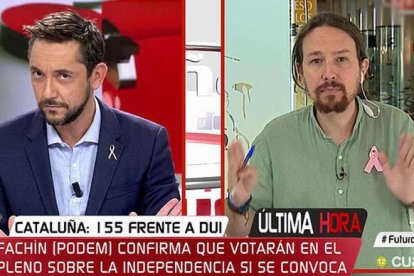 Javier Ruiz, entrevistando en Cuatro a Pablo Iglesias