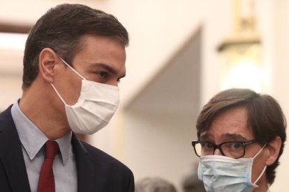 Pedro Sánchez y Salvador Illa.