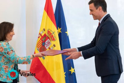 Margarita Robles y Pedro Sánchez