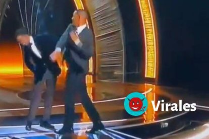 Will Smith y Chris Rock en el momento de la supuesta agresión