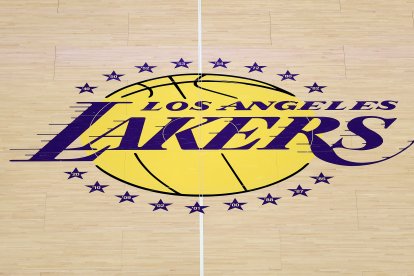 LOS ANGELES, CALIFORNIA - OCTOBER 21: A detailed view of a Los Angeles Lakers logo on the court before the game against the Golden State Warriors at Crypto.com Arena on October 21, 2025 in Los Angeles, California. NOTE TO USER: User expressly acknowledges and agrees that, by downloading and or using this photograph, user is consenting to the terms and conditions of the Getty Images License Agreement. (Photo by Luke Hales/Getty Images)