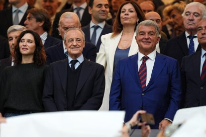 MADRID, SPAIN - OCTOBER 26: Florentino Perez, President of Real Madrid, and Joan Laporta, President of FC Barcelona, look on prior to the LaLiga EA Sports match between Real Madrid CF and FC Barcelona at Estadio Santiago Bernabeu on October 26, 2025 in Madrid, Spain. (Photo by Angel Martinez/Getty Images)