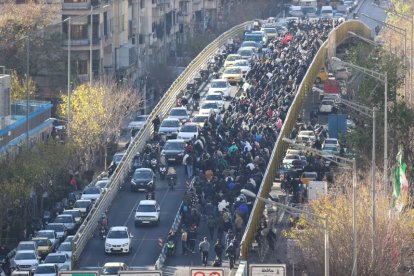Protesters march in downtown Tehran, Iran on December 29, 2025. (Fars News Agency/AP)