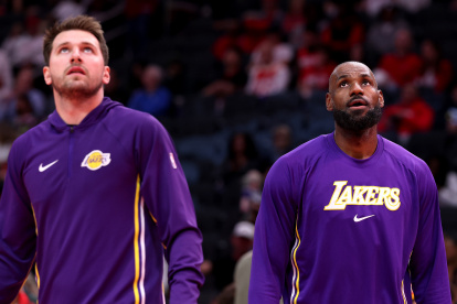 HOUSTON, TEXAS - MARCH 18: LeBron James #23 and Luka Doncic #77 of the Los Angeles Lakers warm up prior to the game against the Houston Rockets at Toyota Center on March 18, 2026 in Houston, Texas. NOTE TO USER: User expressly acknowledges and agrees that, by downloading and or using this photograph, User is consenting to the terms and conditions of the Getty Images License Agreement. (Photo by Kenneth Richmond/Getty Images)
