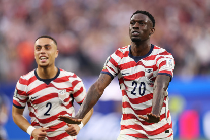 LOS ANGELES, CALIFORNIA - JUNE 12: Folarin Balogun #20 of the United States celebrates scoring his team's third goal during the FIFA World Cup 2026 Group D match between USA and Paraguay at Los Angeles Stadium on June 12, 2026 in Los Angeles, California. (Photo by Richard Heathcote/Getty Images)