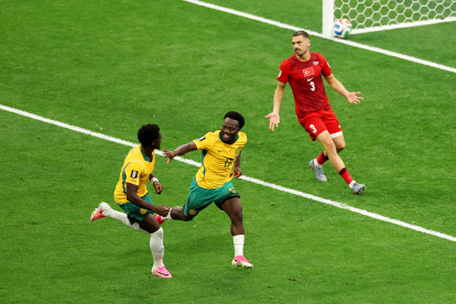 VANCOUVER, BRITISH COLUMBIA - JUNE 13: Nestory Irankunda #17 of Australia celebrates scoring his team's first goal with teammate Mohamed Toure #9 during the FIFA World Cup 2026 Group D match between Australia and Türkiye at BC Place Vancouver on June 13, 2026 in Vancouver, British Columbia. (Photo by Richard Heathcote/Getty Images)