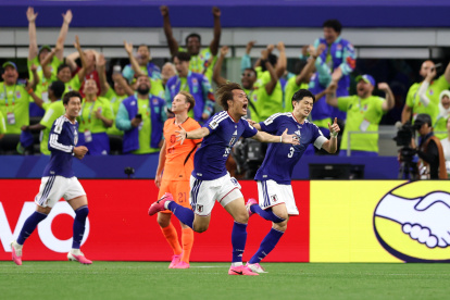 ARLINGTON, TEXAS - JUNE 14: Koki Ogawa #19 of Japan celebrates assisting on his team's second goal by Daichi Kamada #15 during the FIFA World Cup 2026 Group F match between Netherlands and Japan at Dallas Stadium on June 14, 2026 in Arlington, Texas. (Photo by Michael Steele/Getty Images)