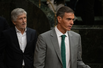 El ministro del Interior, Fernando Grande-Marlaska, y el presidente del Gobierno, Pedro Sánchez