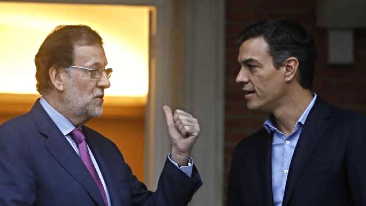 Rajoy y Sánchez, a las puertas de Moncloa