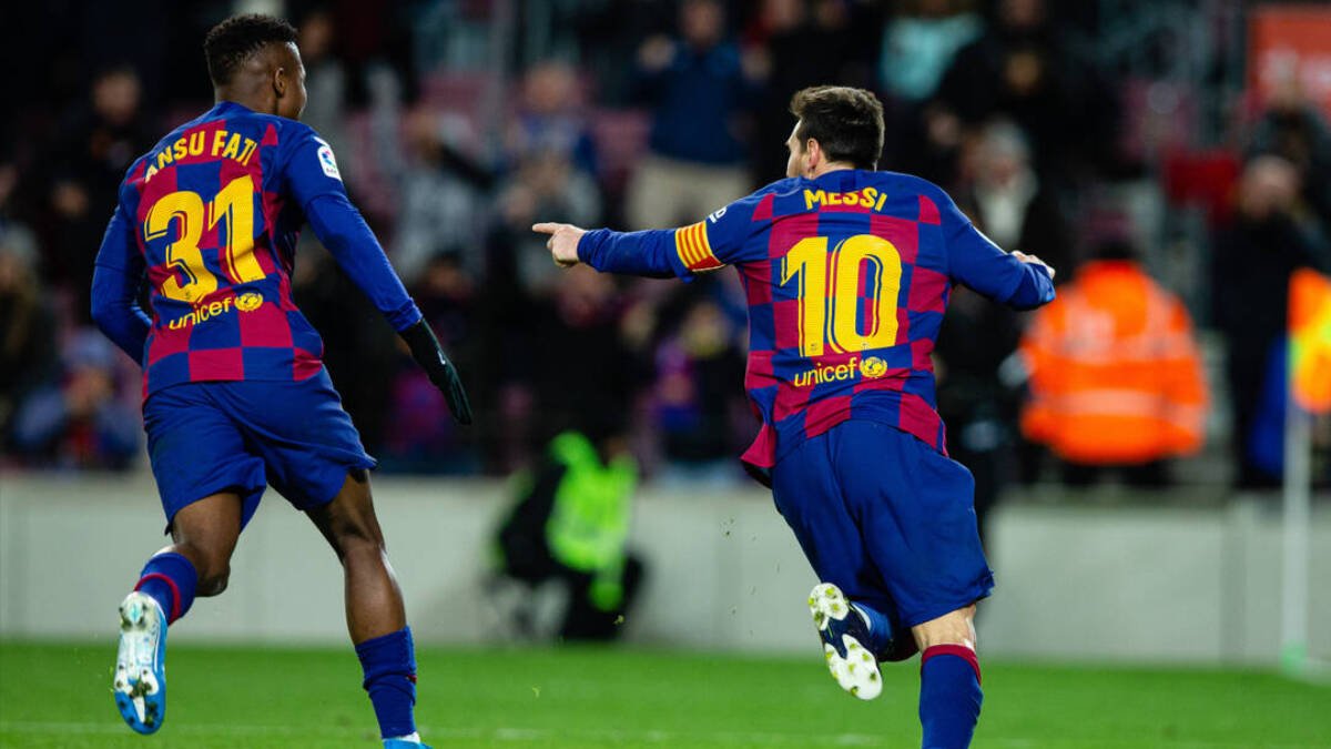 Leo Messi celebra un gol junto a Ansu Fati