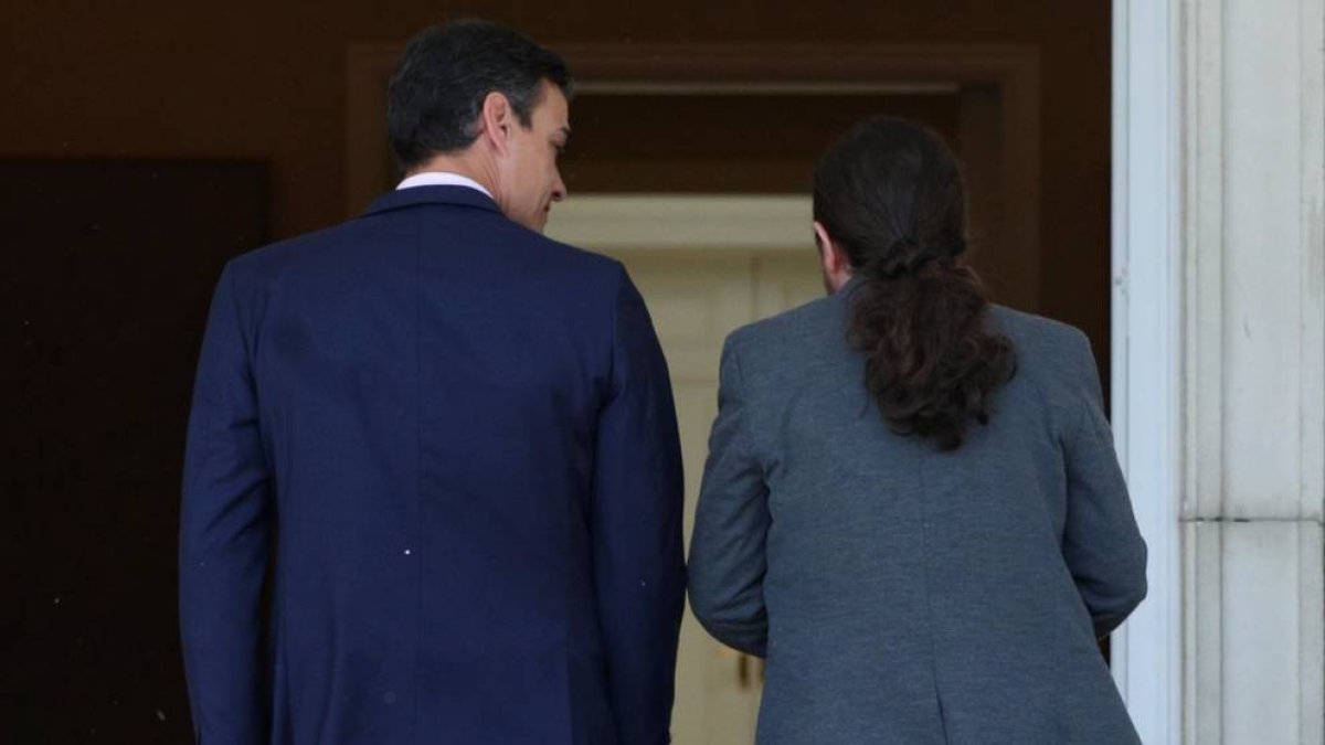 Sanchez e Iglesias, entrando en Moncloa