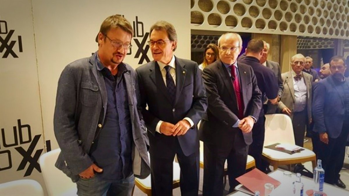 Artur Mas, entre Domenechs y Montilla, ayer en Madrid