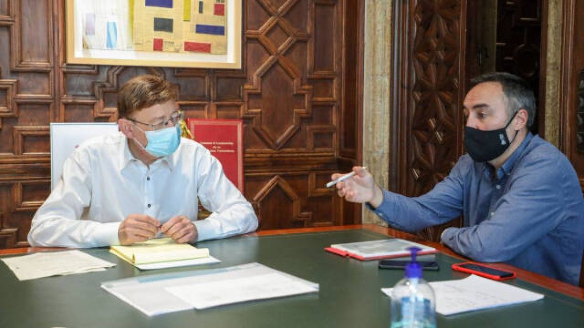 El presidente Puig con el director general Poyatos.