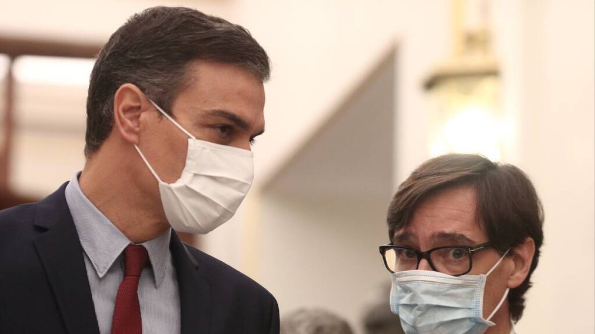 Pedro Sánchez y Salvador Illa.