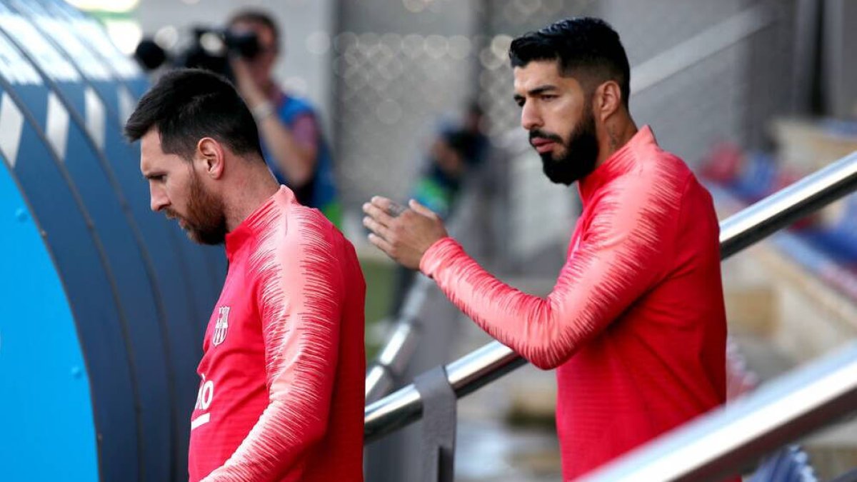 Messi y Suárez, cuando compartían vestuario en el Nou Camp.