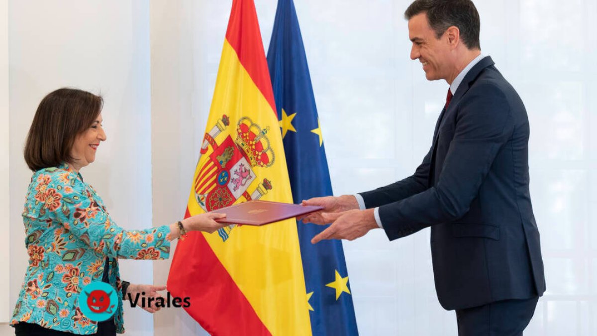 Margarita Robles y Pedro Sánchez