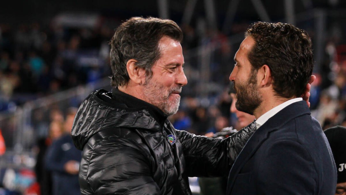 Quique y Baraja, antes del inicio del partido de ayer entre Valencia y Getafe - EUROPAPRESS