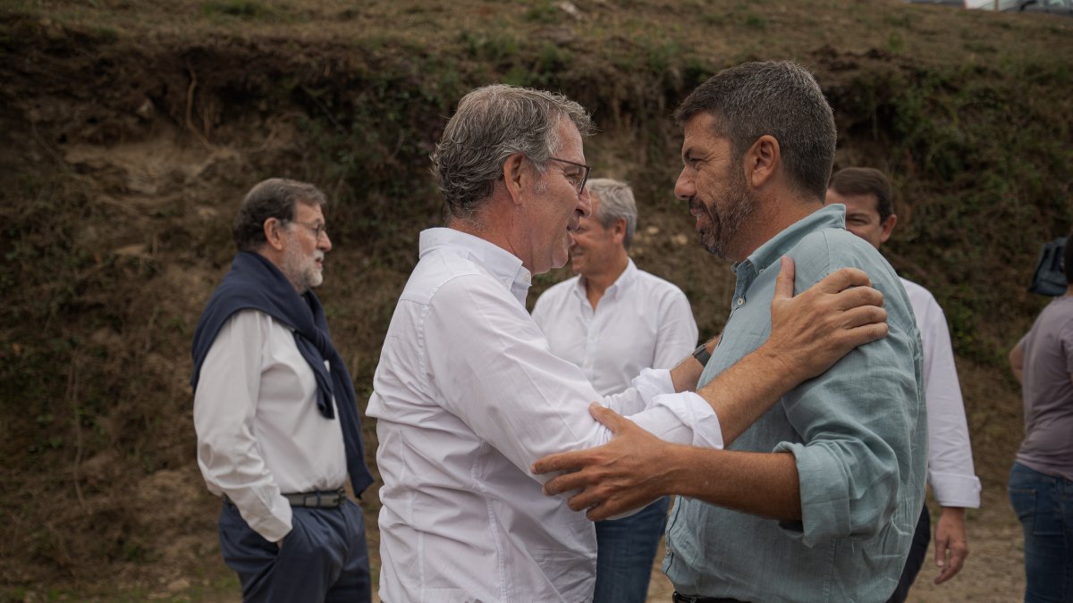 El presidente del PP, Alberto Núñez Feijóo, y el presidente de la Generalitat Valenciana, Carlos Mazón.