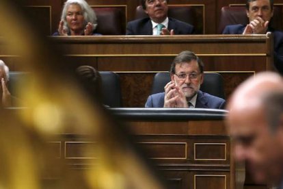 Rajoy satisfecho con el rescate a la banca