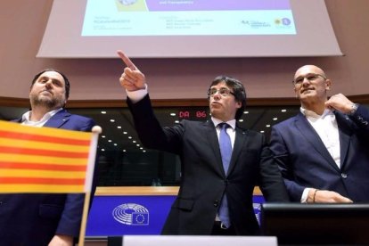 Puigdemont, Romeva y Junqueras.