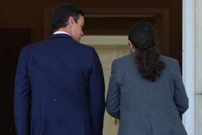 Sanchez e Iglesias, entrando en Moncloa