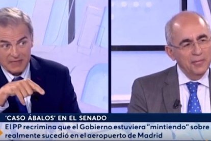 Carmelo Encinas y Paco Rosell durante su discusión.