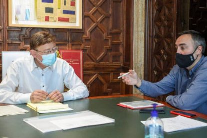 El presidente Puig con el director general Poyatos.