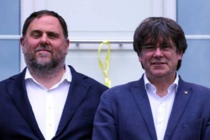 Junqueras y Puigdemont, en su reencuentro este miércoles.