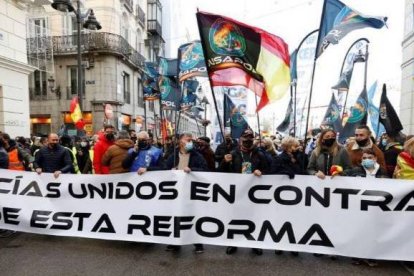 Policías en la última manifestación contra la derogación de la Ley de Seguridad Ciudadana.