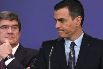 José Luis Escrivá y Pedro Sánchez