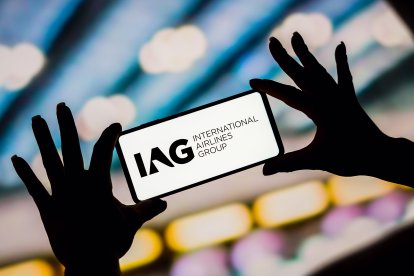 In this photo illustration, the International Airlines Group (IAG) logo is displayed on a smartphone screen.