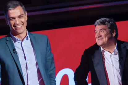 Pedro Sánchez junto al ministro José Luis Escrivá