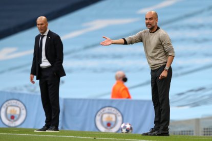 Zidane y Guardiola, durante un partido.