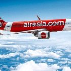 Air Asia presenta el nuevo uniforme de la tripulación de cabina con equipo de protección