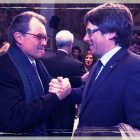 Mas y Puigdemont, en febrero, en el juicio del 9N