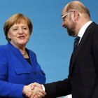 Merkel y Schulz, en una imagen que simboliza su probable acuerdo