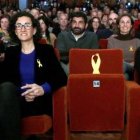 Marta Rovira, en un mitin de ERC, junto al sillón vacío de Oriol Junqueras.