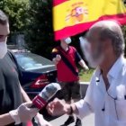 Un reportero de APM y un manifestante de Vox