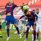 Sergio Ramos y Gerard Piqué, en el último Madrid-Barça en el que se han enfrentado.