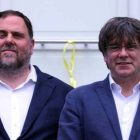 Junqueras y Puigdemont, en su reencuentro este miércoles.