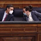 El presidente del Gobierno, Pedro Sánchez junto al por entonces vicepresidente segundo del Gobierno, Pablo Iglesias.